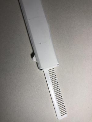 OTF Switchblade Hairbrush