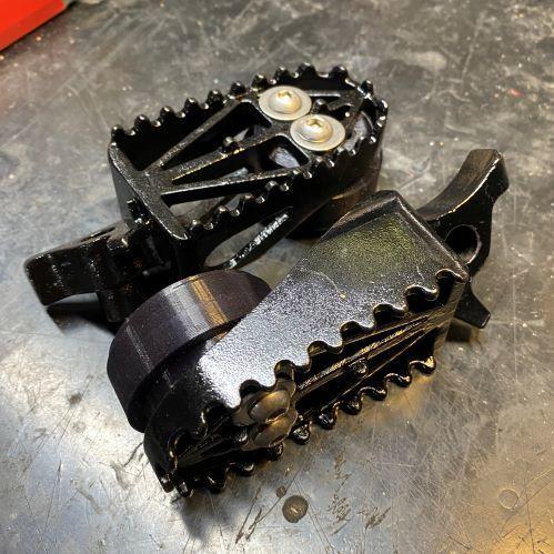 Aprilia SXV footpeg slider