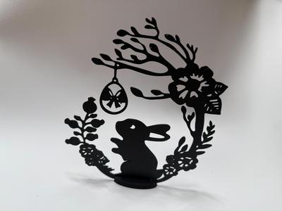 bunny silhouette with easter egg with stand