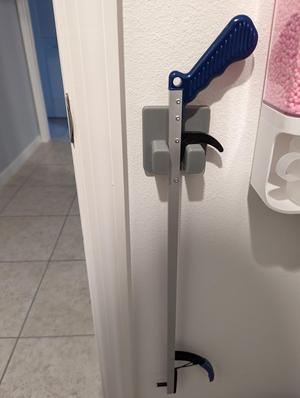 Wall mount holder for grabber/reacher