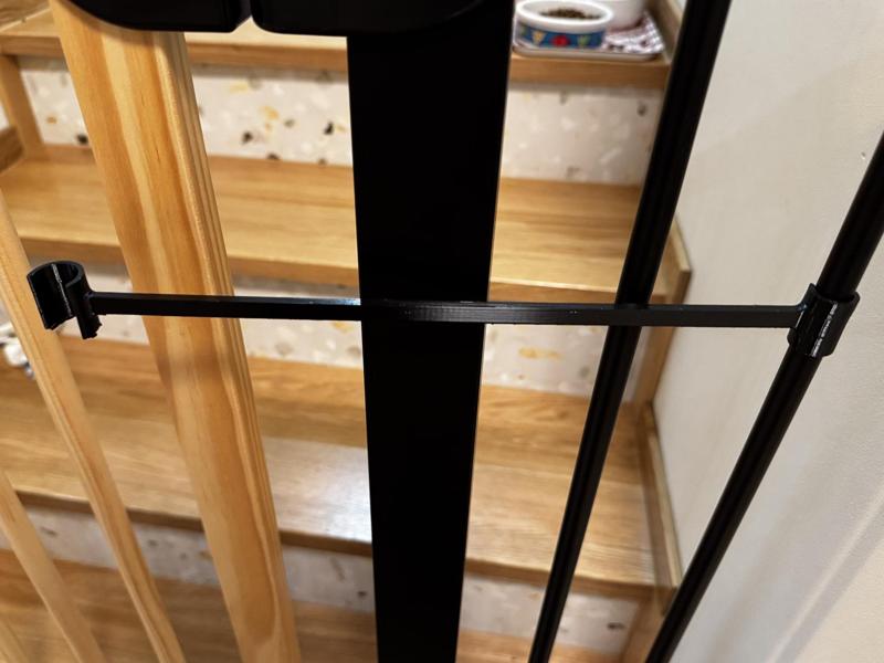 Holder piece for baby safety gate w/ hanger
