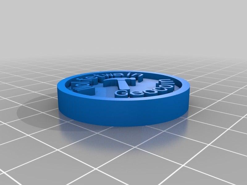 Wolfetwain Geocoin