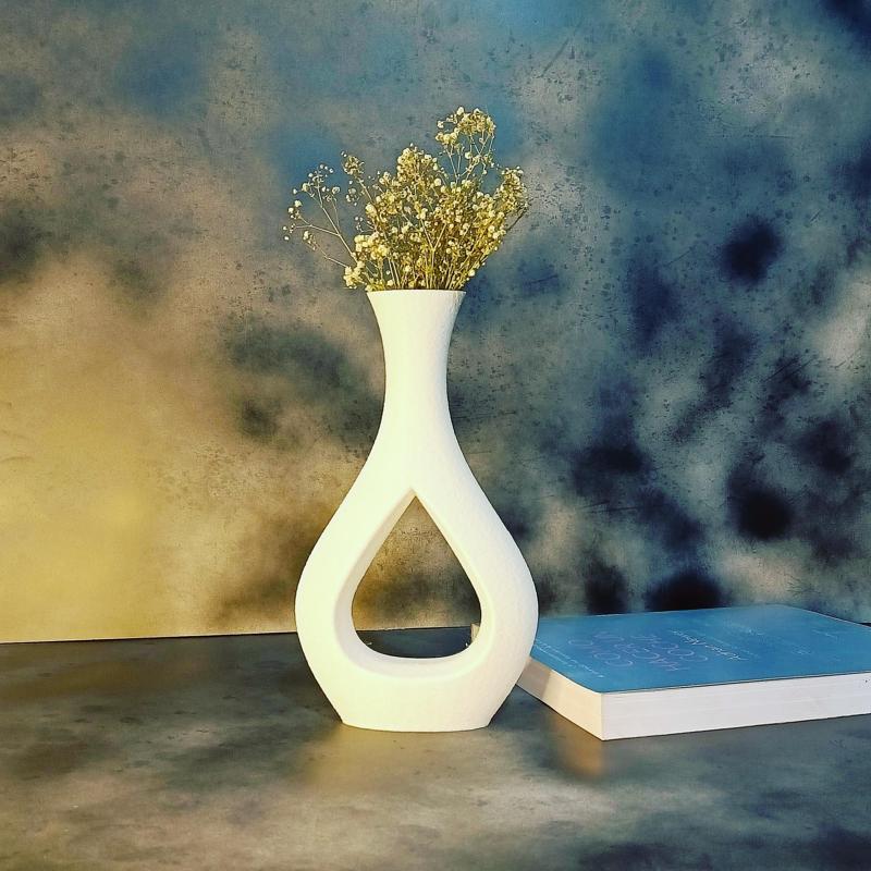 Perforated vase drop