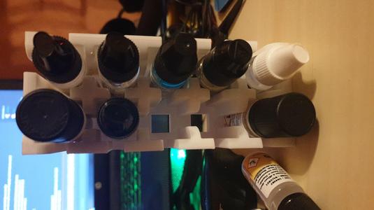 Vertical e-liquid holder