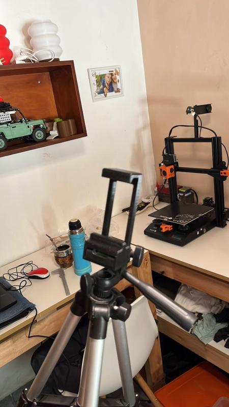 Cell phone holder for tripod