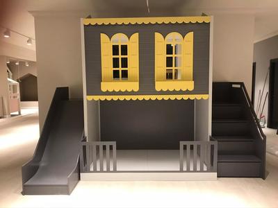two-story bunk bed and play area