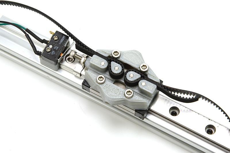 Kossel carriage with implant screw support for belt tension and endstop trigger adjustable