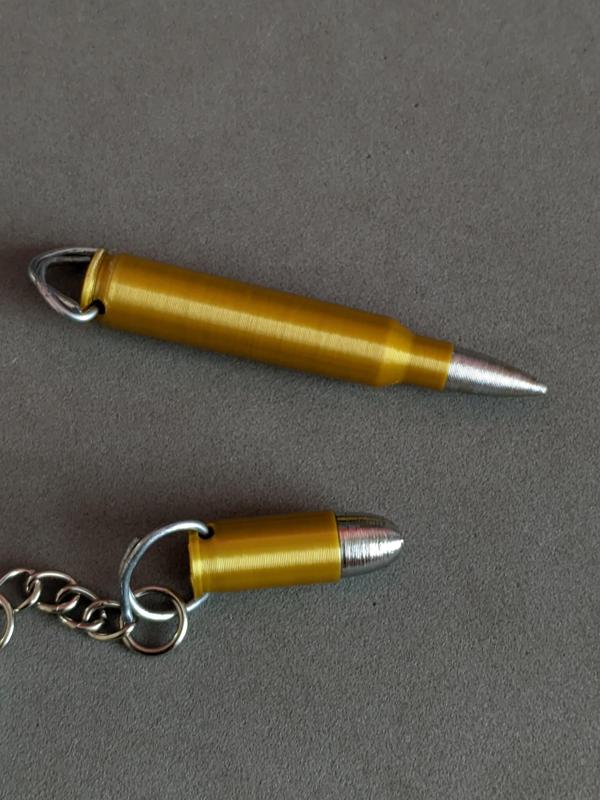 Decorative bullets for key chains or necklaces