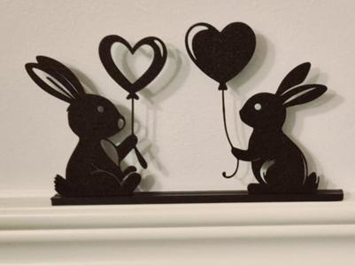 Easter bunnys in love with holder