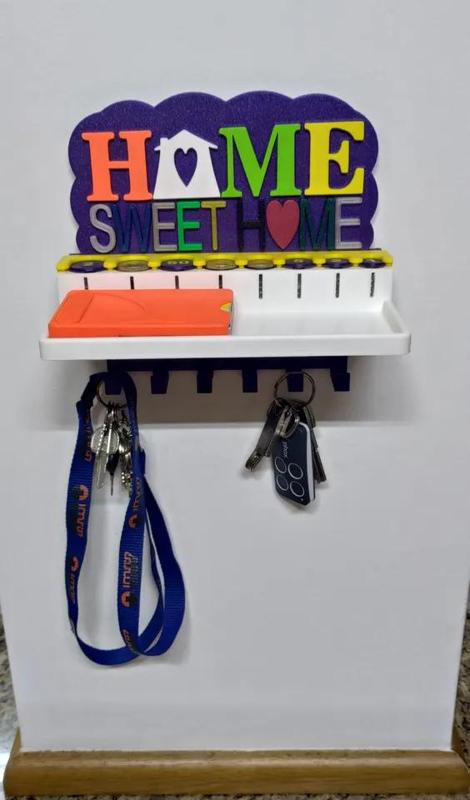 Key Holder with coin dispenser   