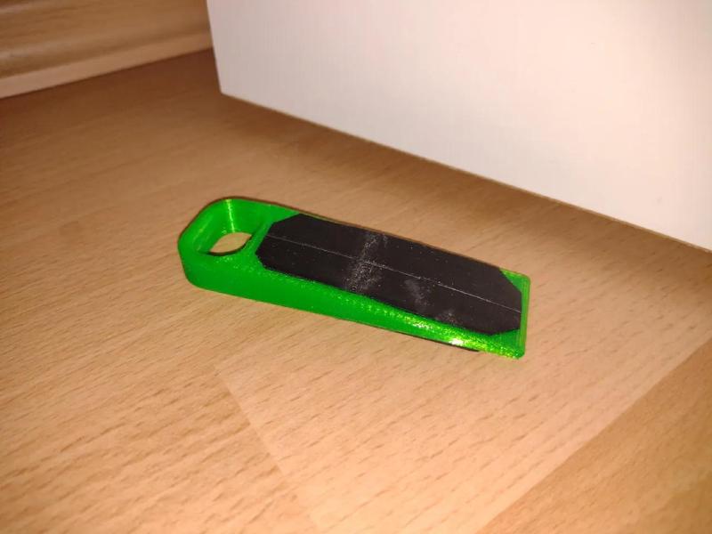 Door stopper - simple and self inhibiting   