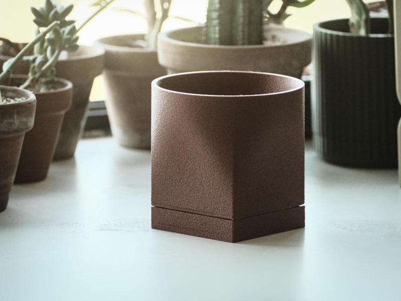 Modern plant pot with drip tray