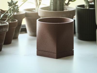 Modern plant pot with drip tray