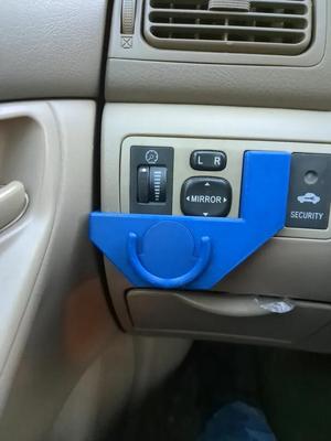 Corolla pop socket phone mount for empty accessory button.   