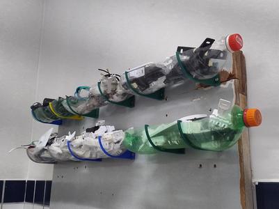 PET bottle shelf support