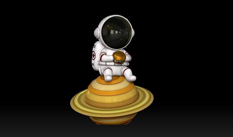 Astronaut with hamburger on the moon