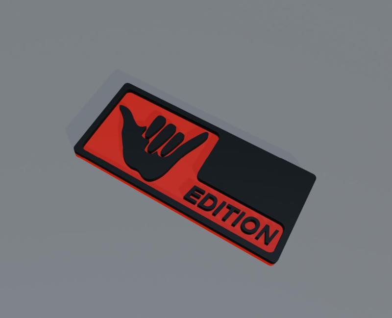 "funny edition" car badge