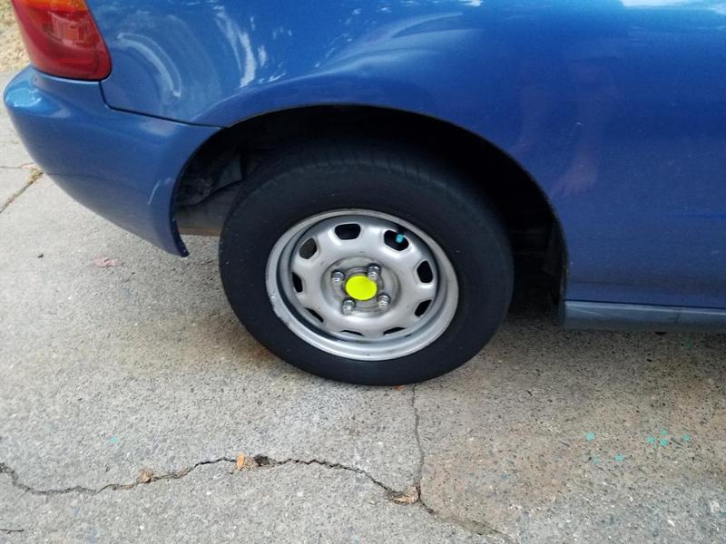 Honda 13 inch wheel center cap. (blank)