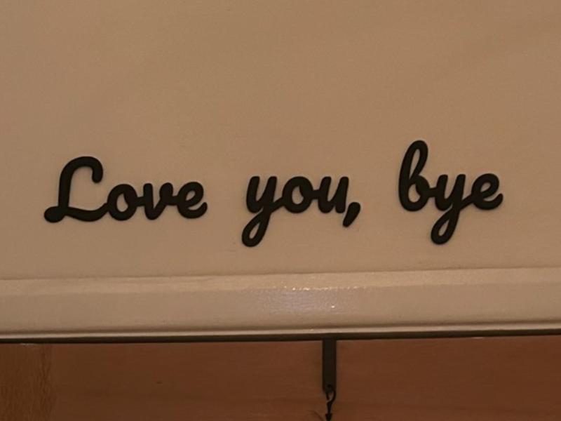 Love you bye wall sign