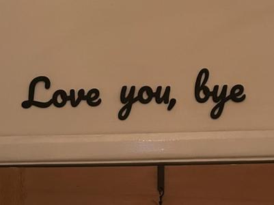 Love you bye wall sign
