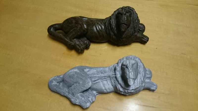 Carved stone lion statue