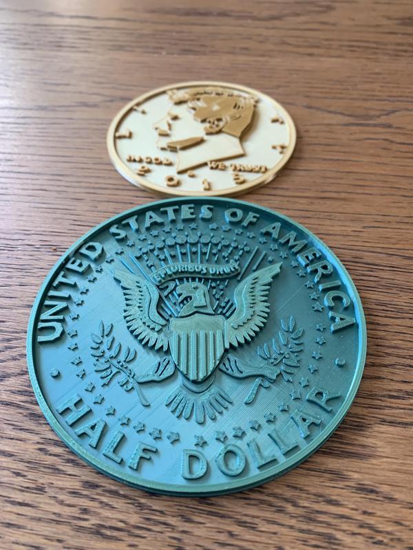 Kennedy Half dollar coin 2 faces