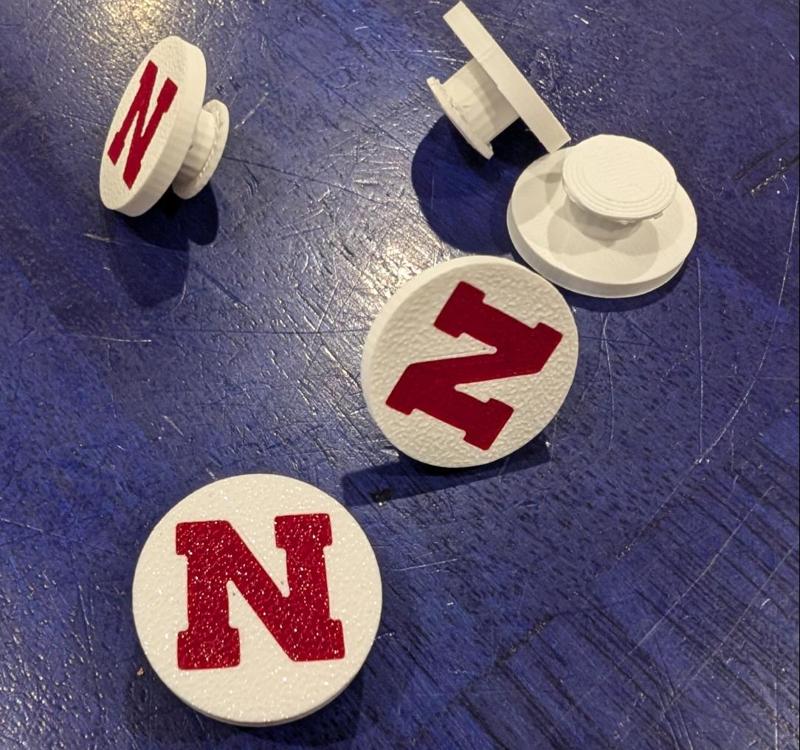 Huskers Croc Charm