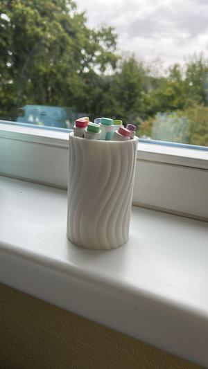 Spiral pen holder