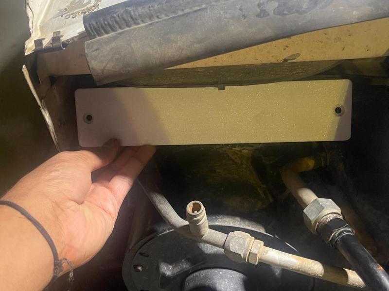 Cabin filter cover for a 2007 Sterling dump truck