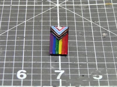 Inclusive Pride enamel pin