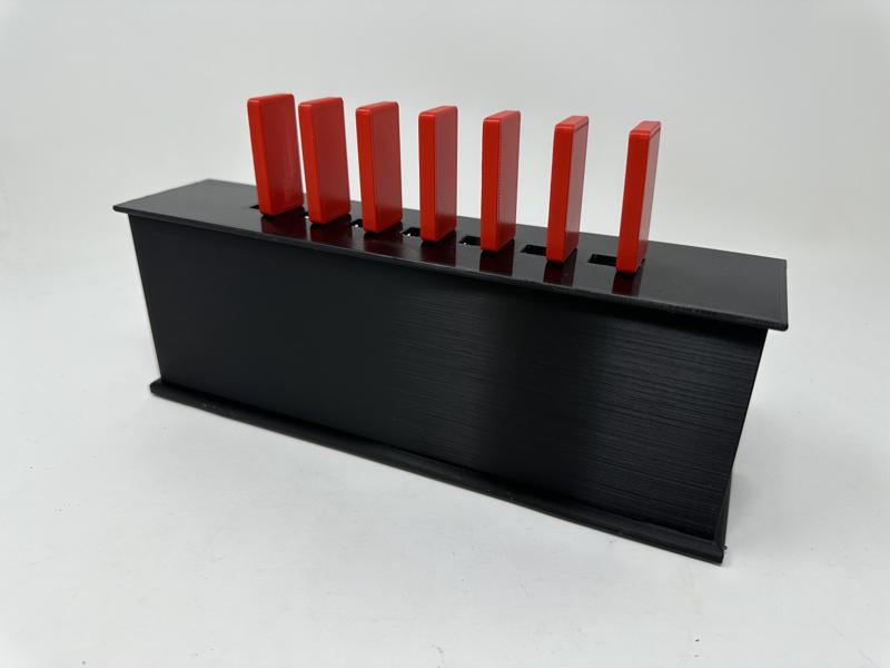 A "Do Nothing" Dominoes Box.