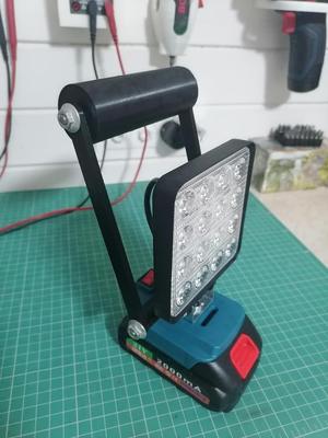 Handle for carrying a Chinese flashlight for a Makita battery