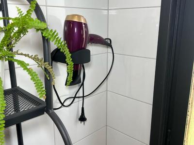 Holder for hair dryer and cable