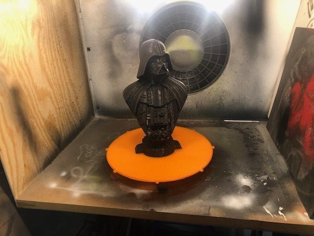 Turn table for paint boot