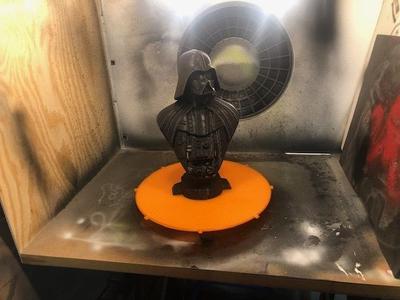 Turn table for paint boot