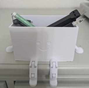Desk organizer with articulated legs