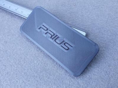 Toyota Prius trunk service hole cover
