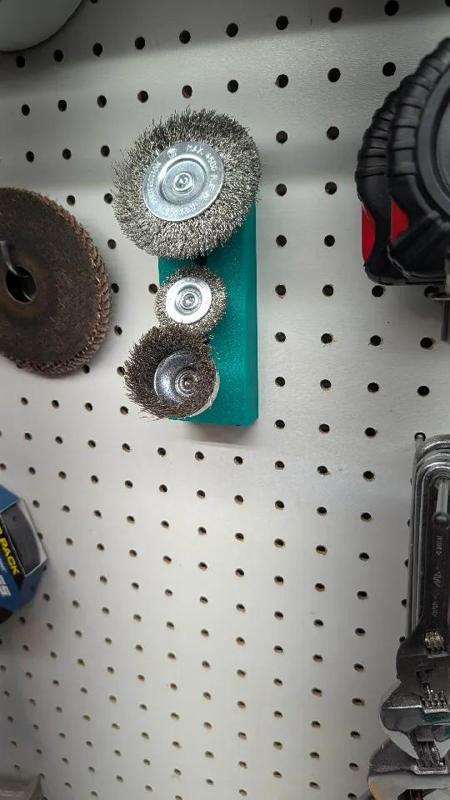 Wirewheel holder for pegboard   