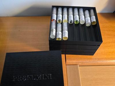 Profumini: Stackable perfume samples organizer.