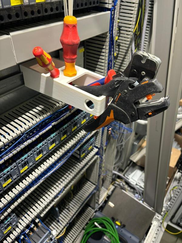 Top-hat rail tool holder, top-hat rail, tool holder, top-hat rail storage arm