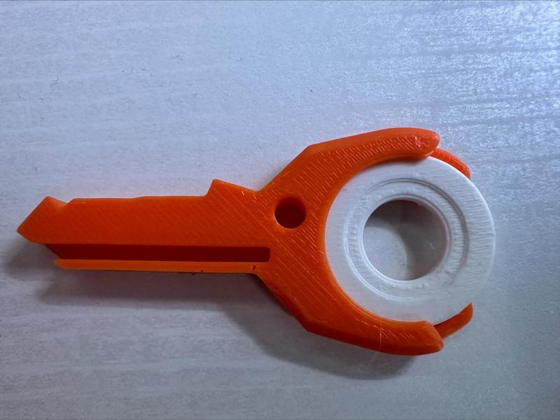 Key-shaped cart coin holder