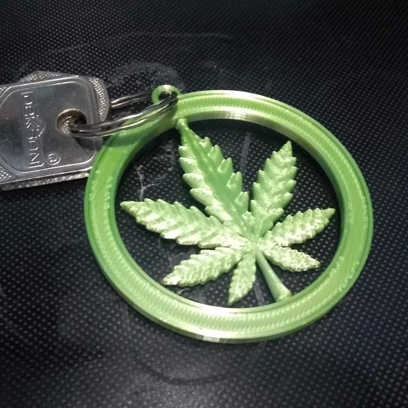 Spinning cannabis keychain