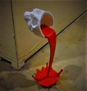 Floating Spilling Skull