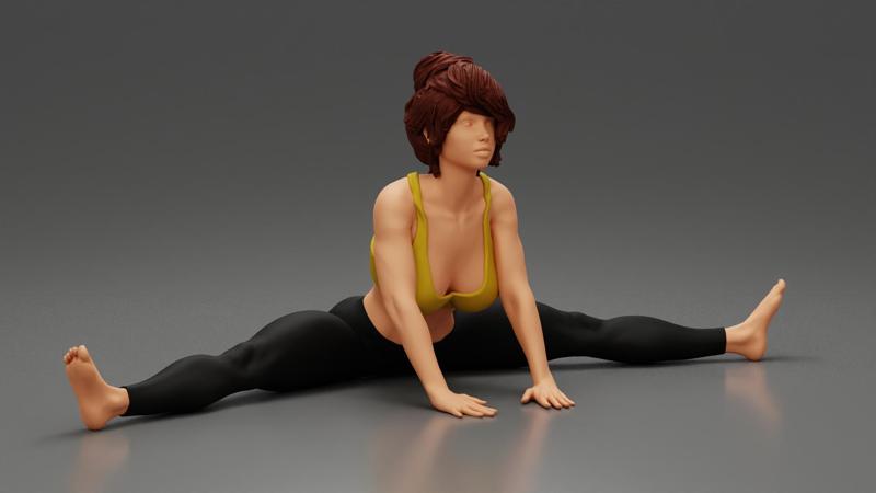 Beautiful Woman Practicing Wide Angle Seated Forward Bend Yoga