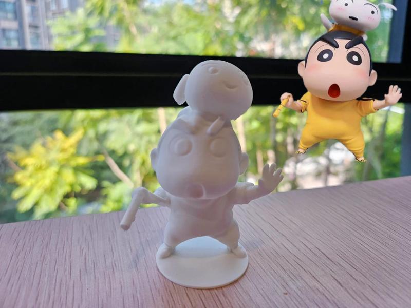 Crayon Shin-chan wielding nunchaku