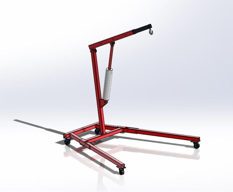 Crane lifts engines with telescopic beam and hydraulic cylinder.