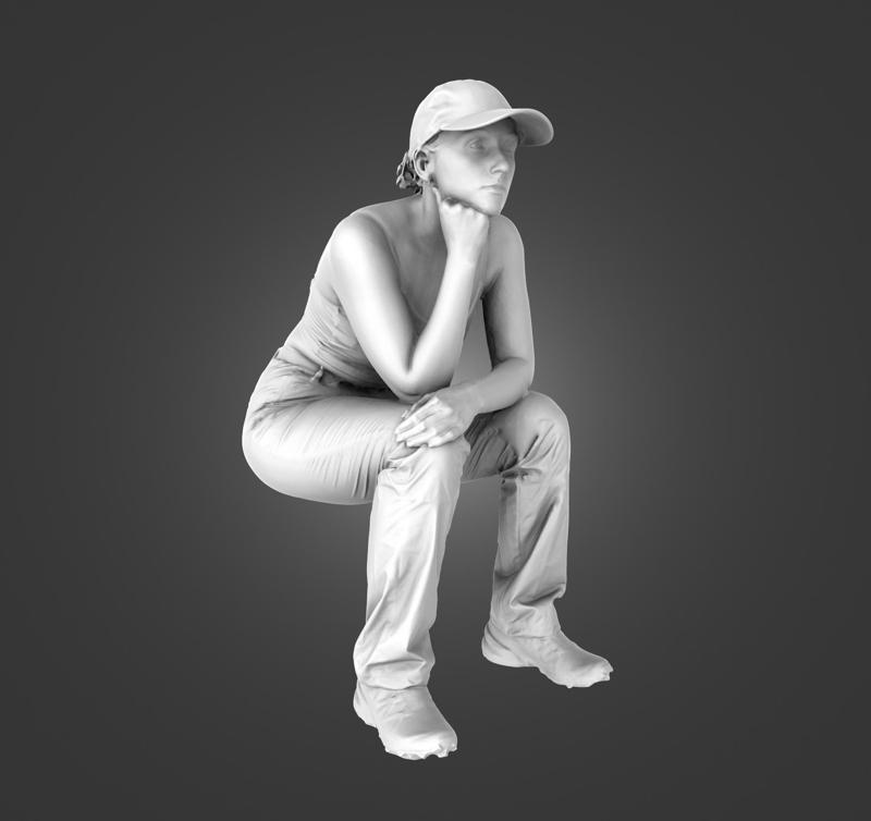 Female passenger sitting with cap