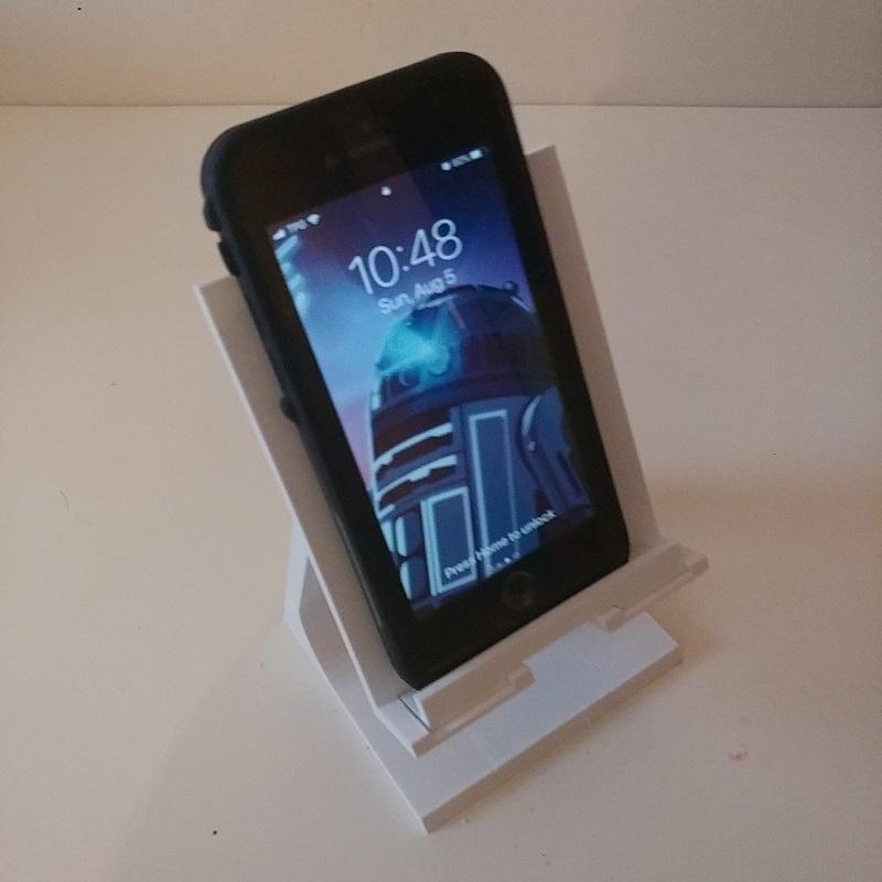 Universal phone/tablet stand with adjustable slider limit (especially for larger phones with cases)