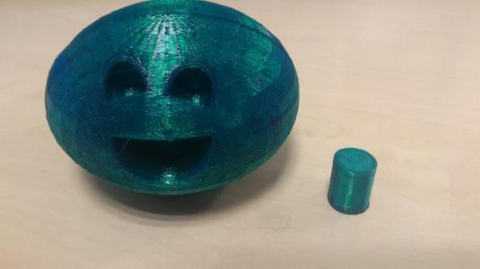 Surprising emoji ear bud holder:by devaughn turner