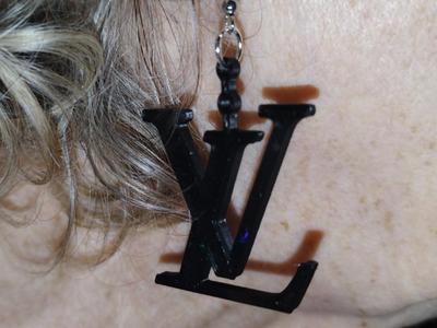 earring and keychain LV